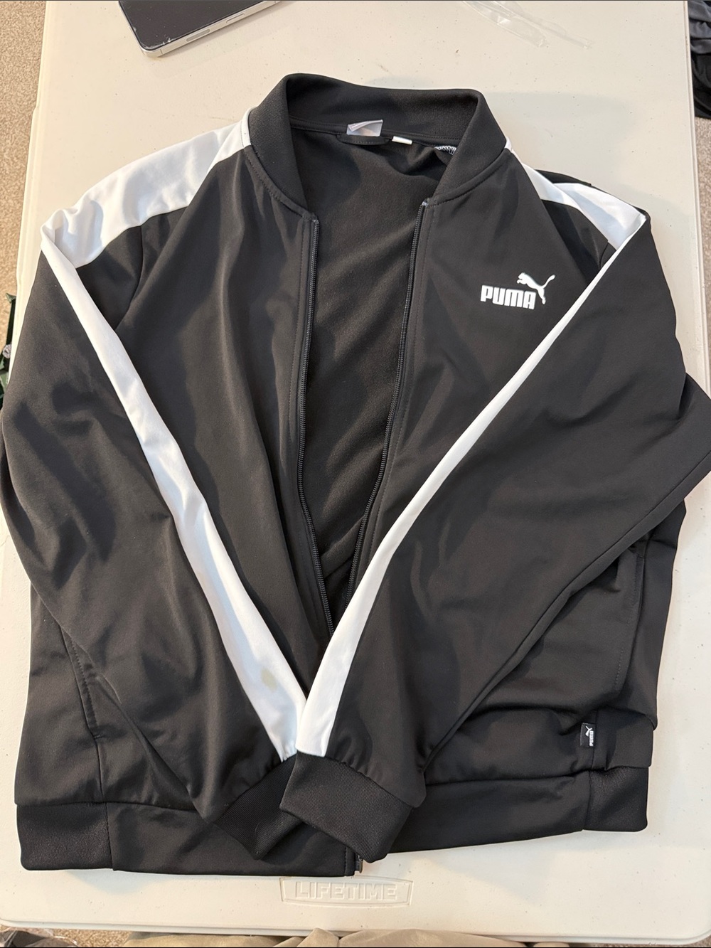 Puma Black Jacket with White Shoulder Stripes
